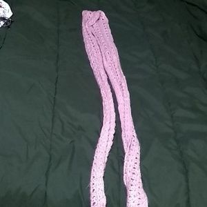Hand knit scarf. A pinkish mauve color.